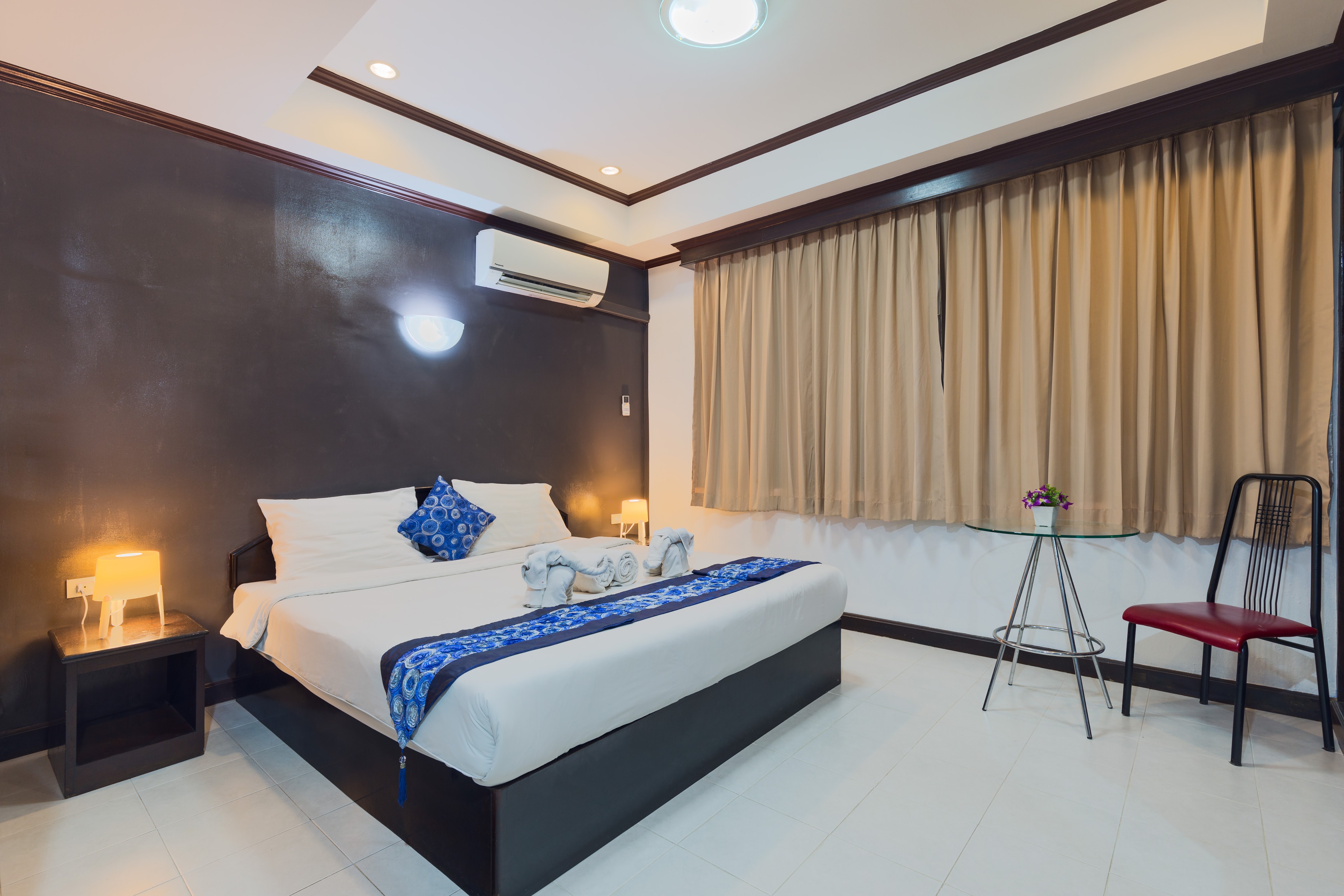 Grand Orchid inn Hotel