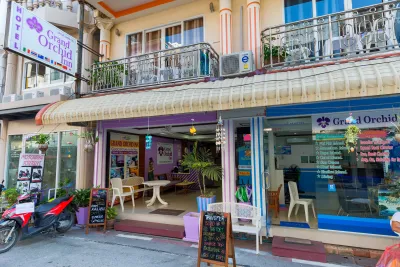 Grand Orchid inn Hotel